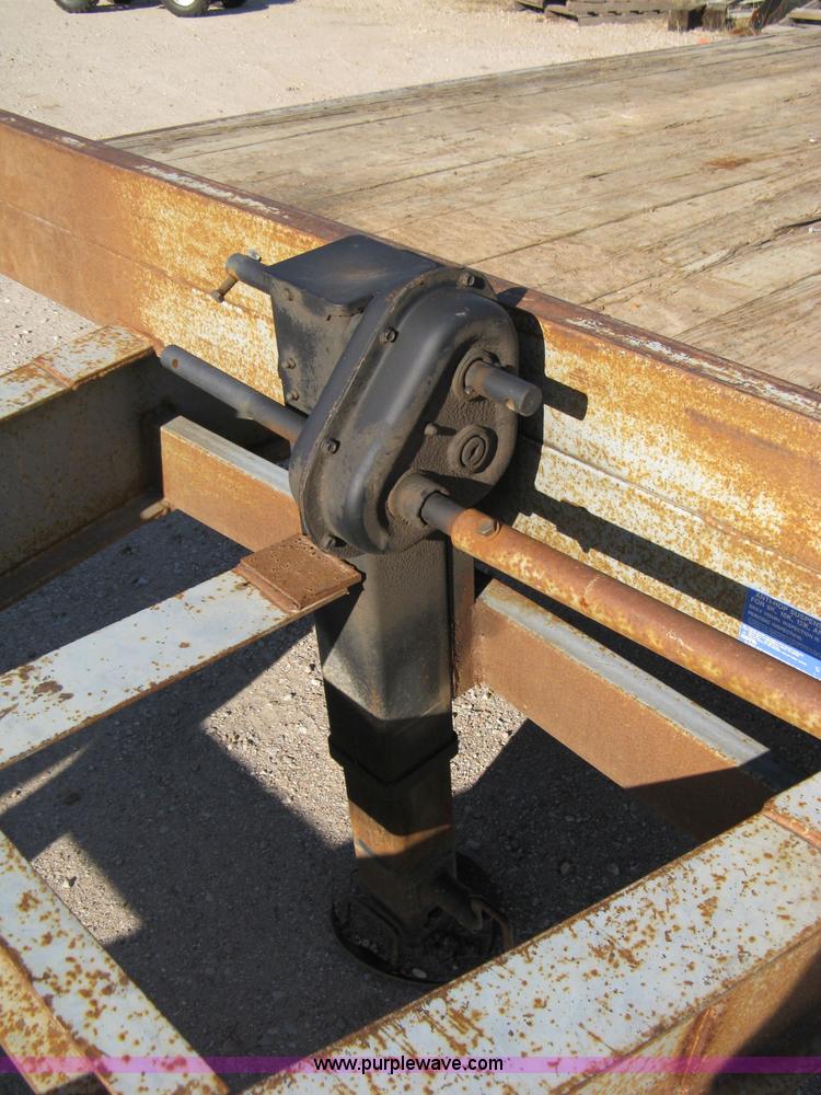 image for item 8041 1997 Circle D 25BHFB dual tandem axle flatbed trailer