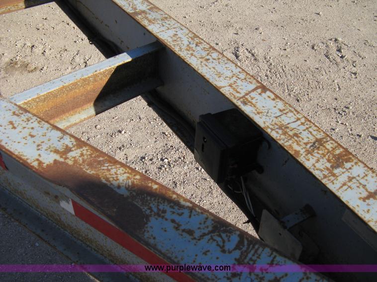 image for item 8041 1997 Circle D 25BHFB dual tandem axle flatbed trailer