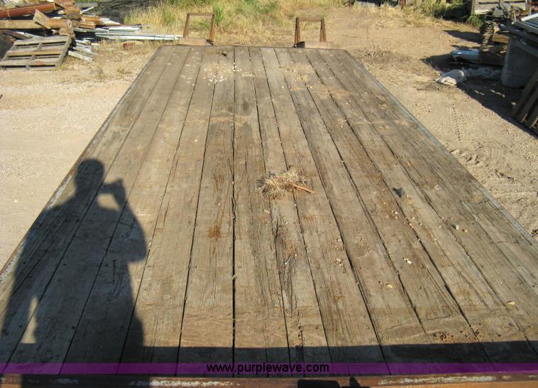 image for item 8041 1997 Circle D 25BHFB dual tandem axle flatbed trailer