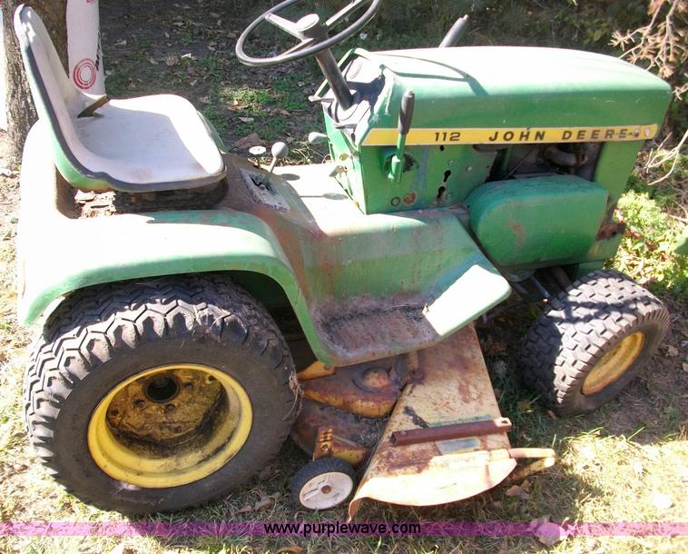 image for item 1810 John Deere 112 lawn mower for parts