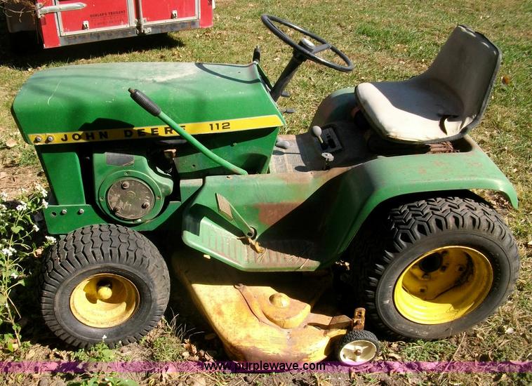 image for item 1810 John Deere 112 lawn mower for parts