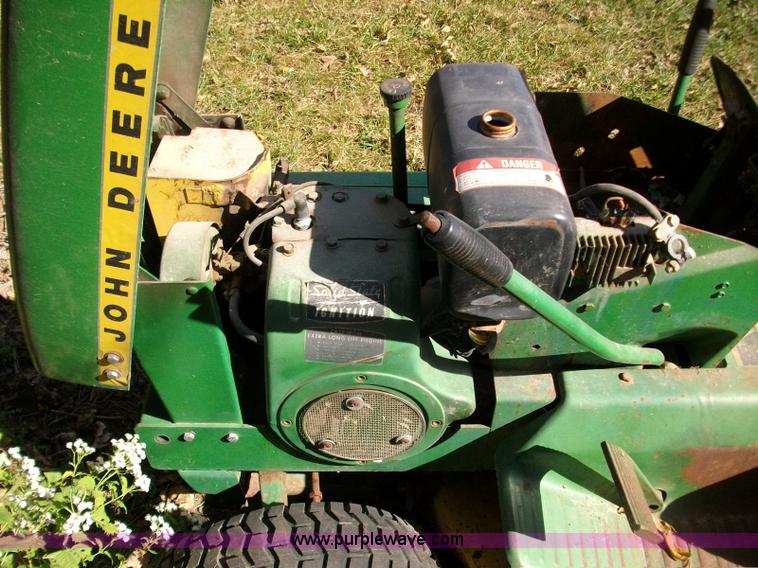 image for item 1810 John Deere 112 lawn mower for parts