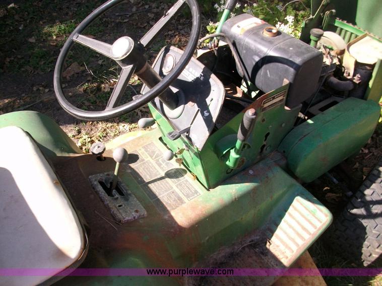 image for item 1810 John Deere 112 lawn mower for parts