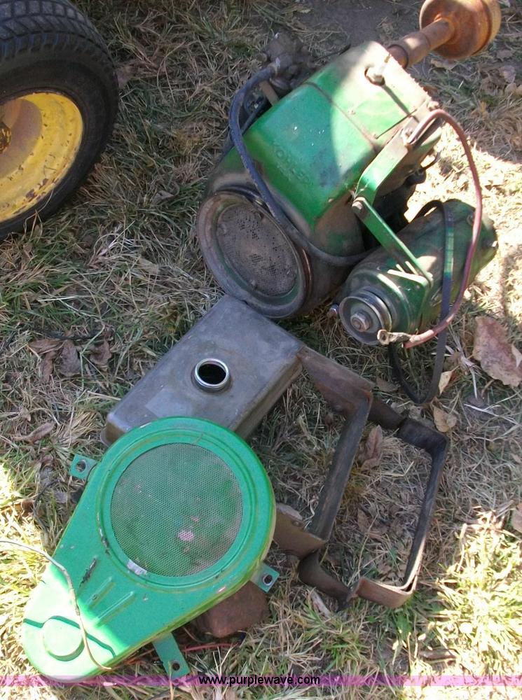 image for item 1811 John Deere 110 mower