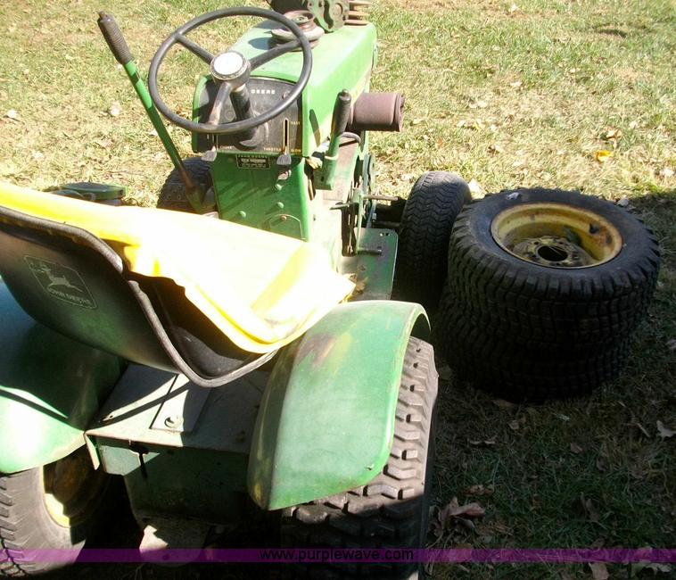 image for item 1811 John Deere 110 mower