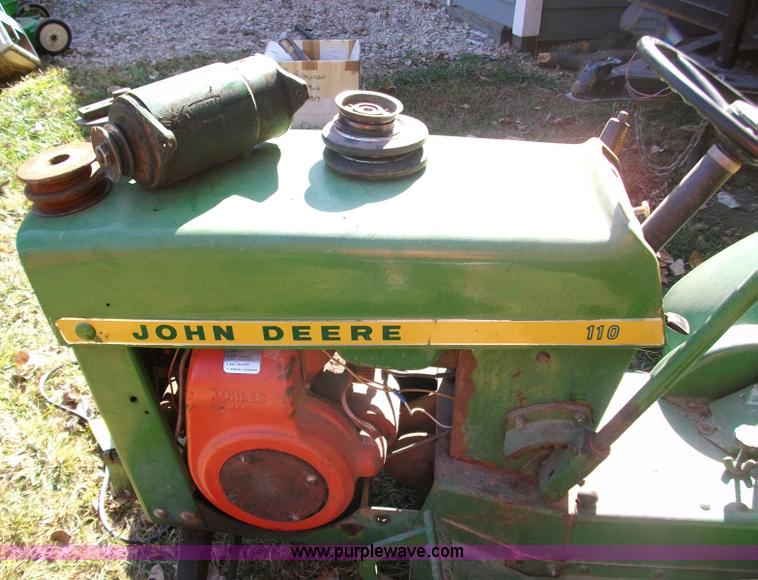 image for item 1811 John Deere 110 mower