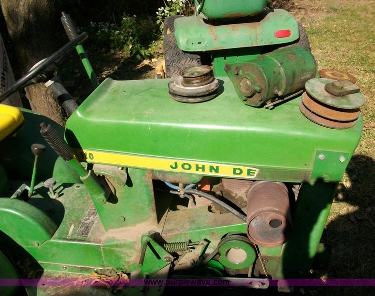 image for item 1811 John Deere 110 mower