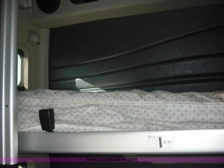 image for item 3638 2003 Volvo VNL semi truck