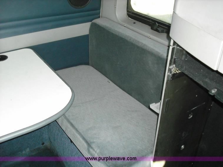 image for item 3638 2003 Volvo VNL semi truck