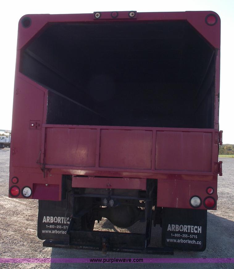 image for item 5951 2004 International Series 4200 truck with Chipper dump bed