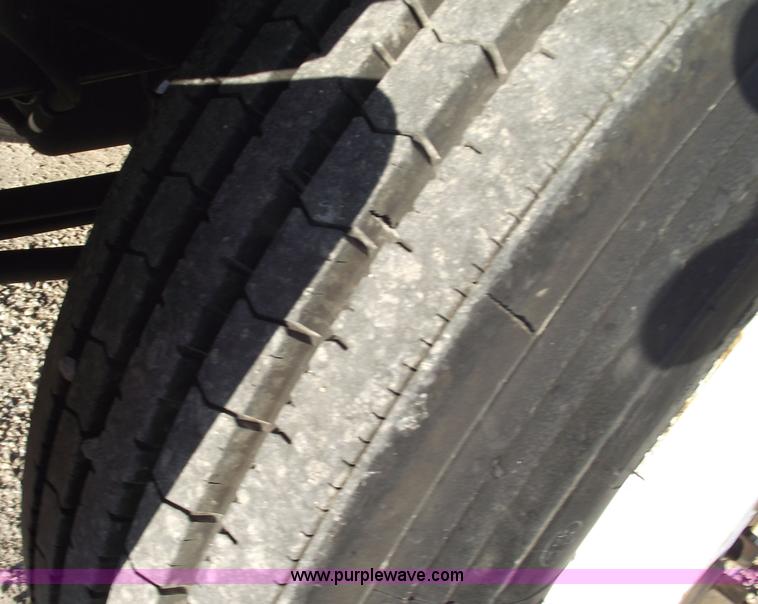 image for item 5951 2004 International Series 4200 truck with Chipper dump bed