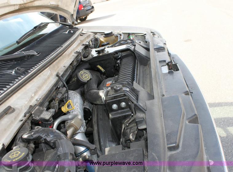 image for item 6193 2004 Ford E450 Super Duty cab and ambulance chassis