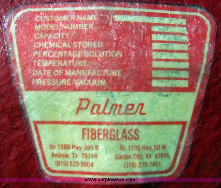 image for item 9001 1985 Palmer Manufacturing 1600 gal. red fiberglass skid water tank