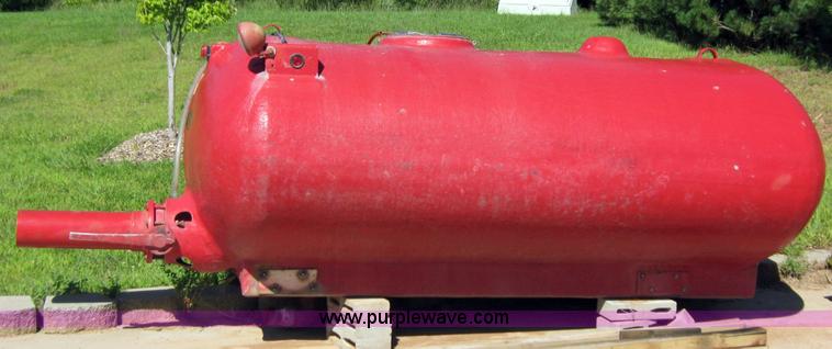 image for item 9001 1985 Palmer Manufacturing 1600 gal. red fiberglass skid water tank