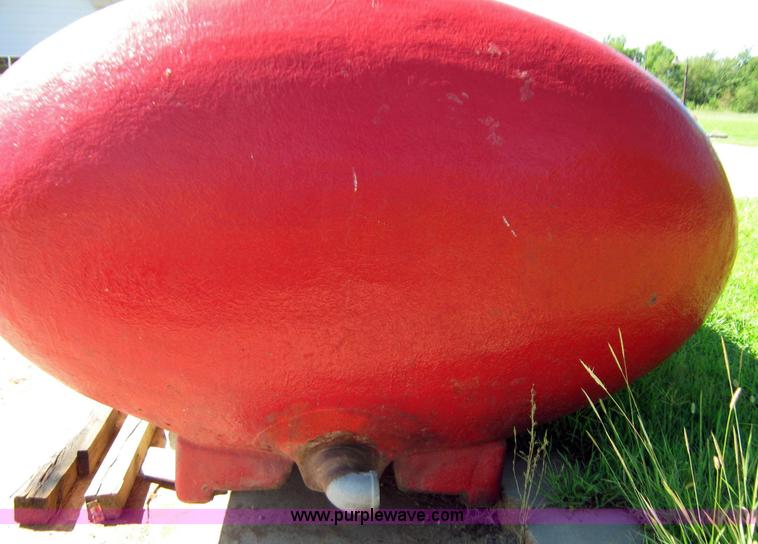 image for item 9001 1985 Palmer Manufacturing 1600 gal. red fiberglass skid water tank