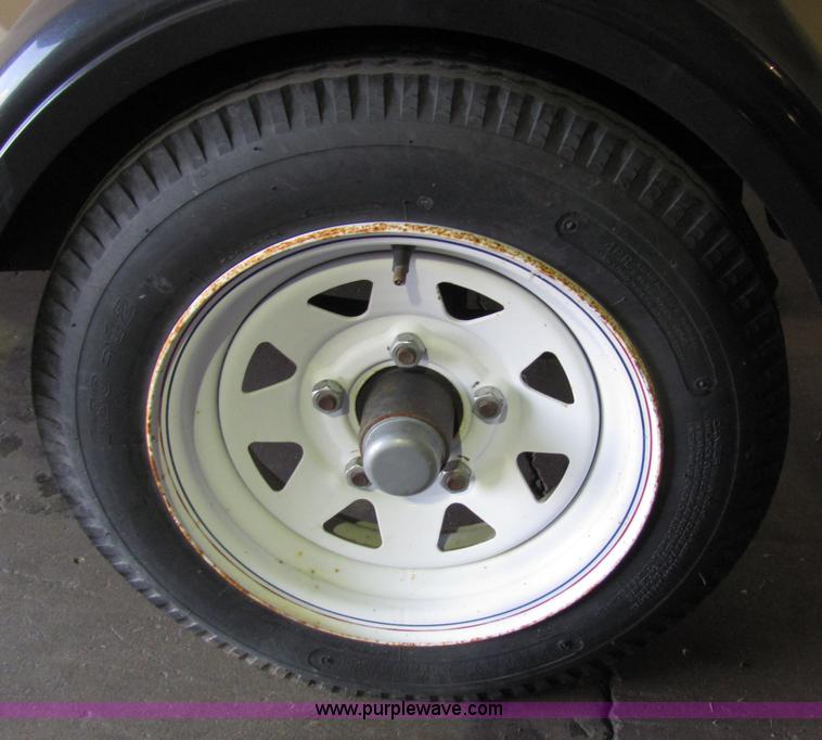 image for item 2269 Camouflaged 7' Yuppie Wagon trailer