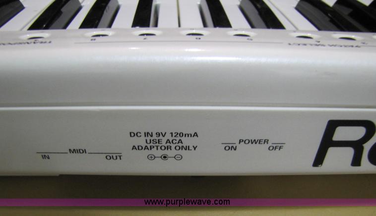 image for item 5203 Roland AX-7 piano guitar