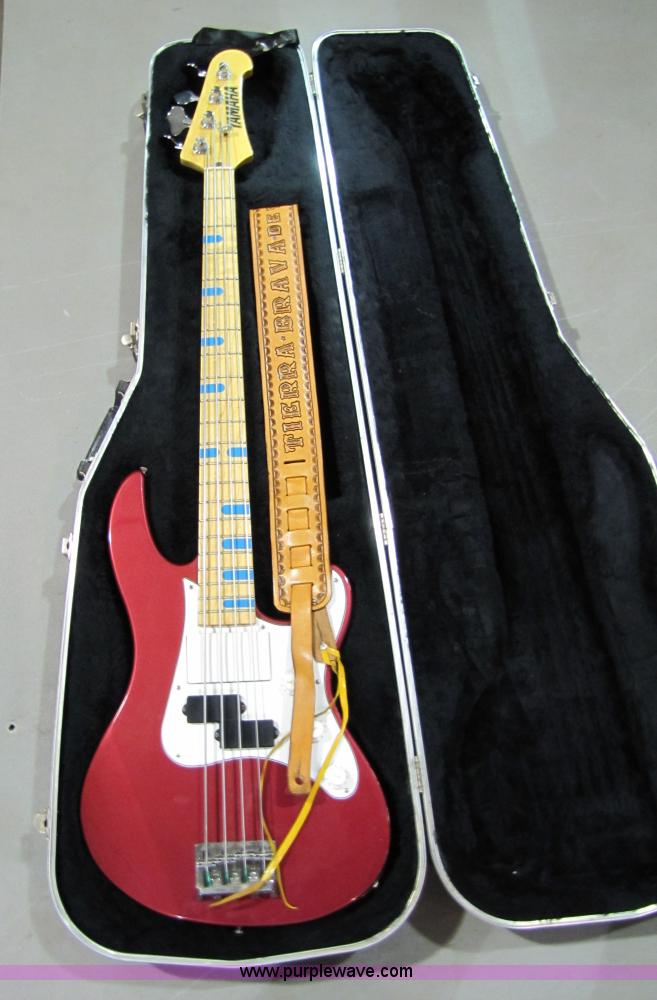 image for item 5331 Yamaha bass guitar with case and leather sling