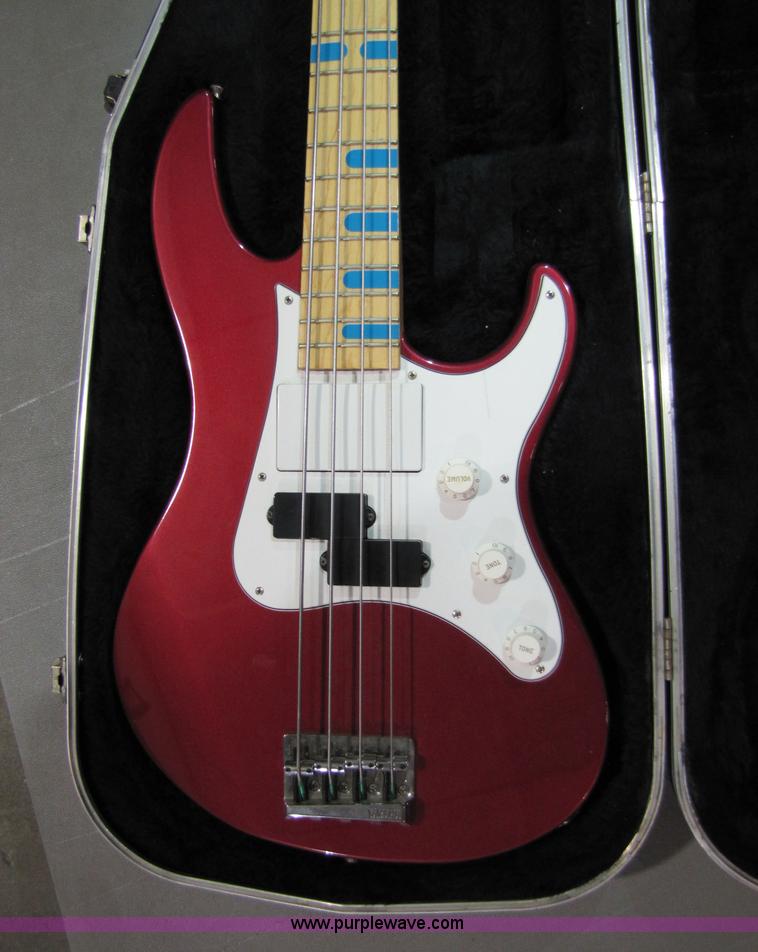 image for item 5331 Yamaha bass guitar with case and leather sling