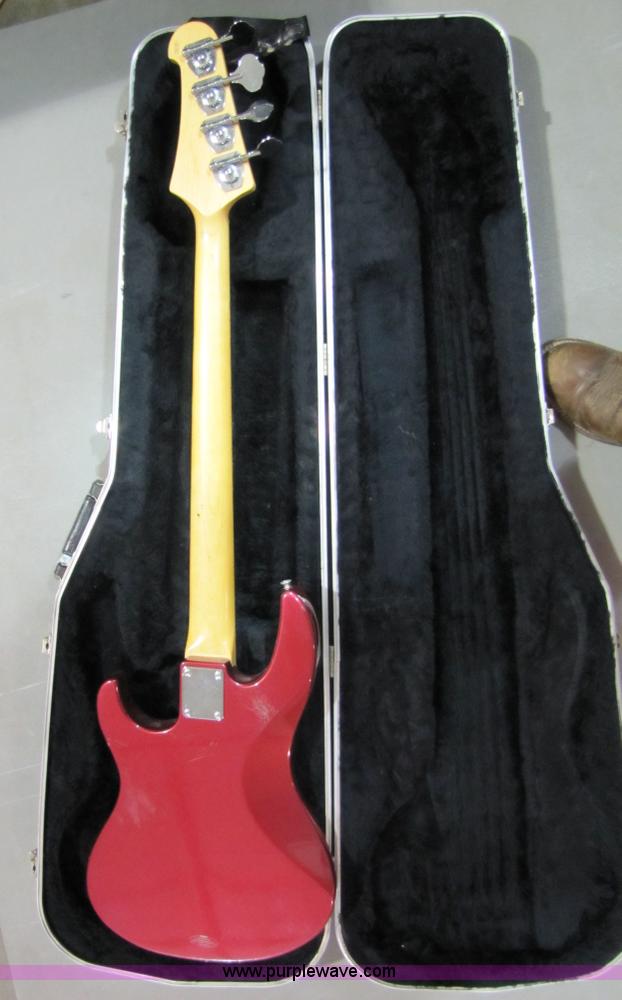 image for item 5331 Yamaha bass guitar with case and leather sling