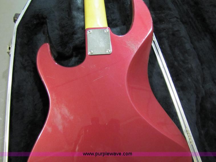 image for item 5331 Yamaha bass guitar with case and leather sling