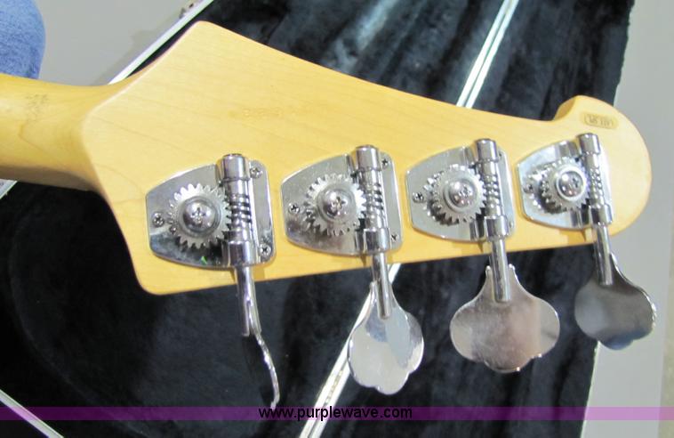 image for item 5331 Yamaha bass guitar with case and leather sling