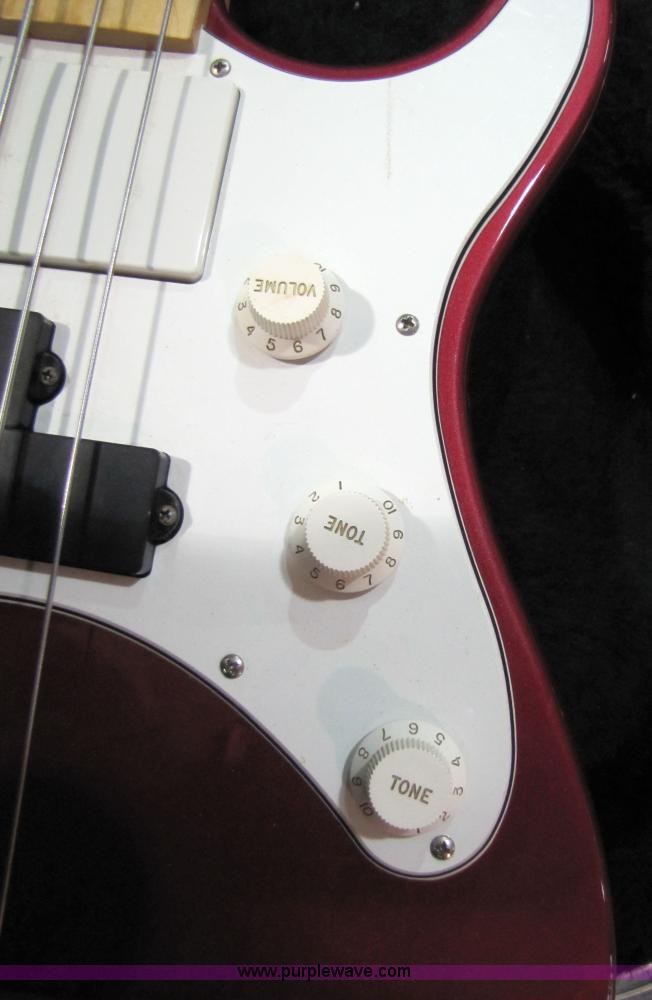 image for item 5331 Yamaha bass guitar with case and leather sling