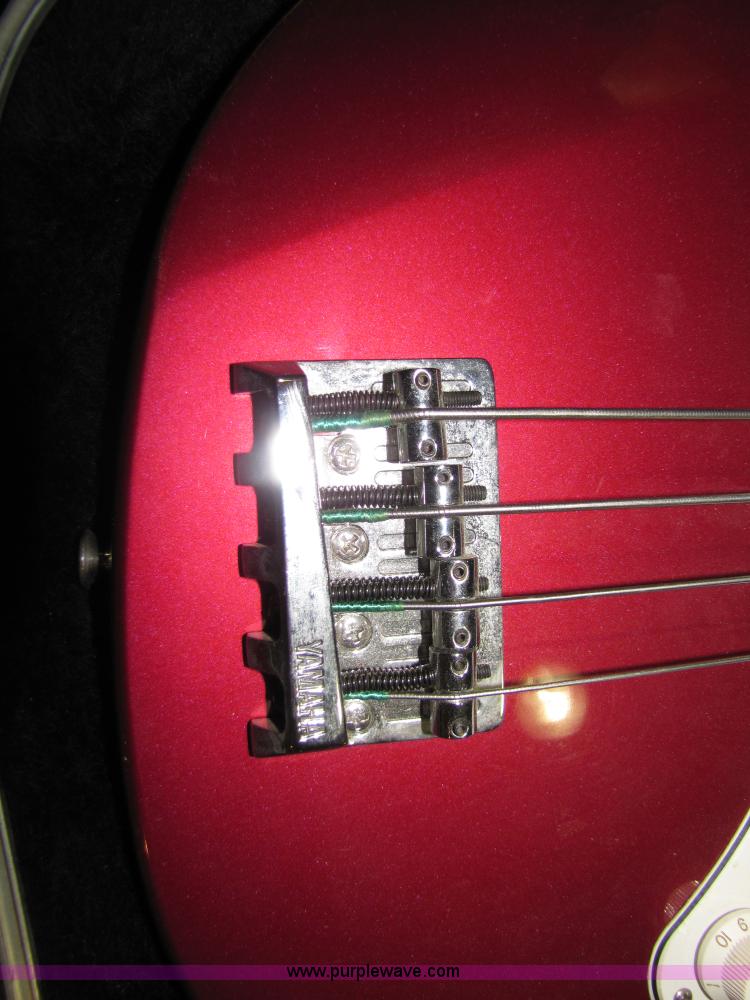 image for item 5331 Yamaha bass guitar with case and leather sling
