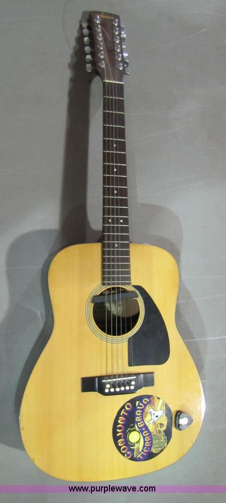 image for item 5332 Eterna acoustic guitar with case and leather sling