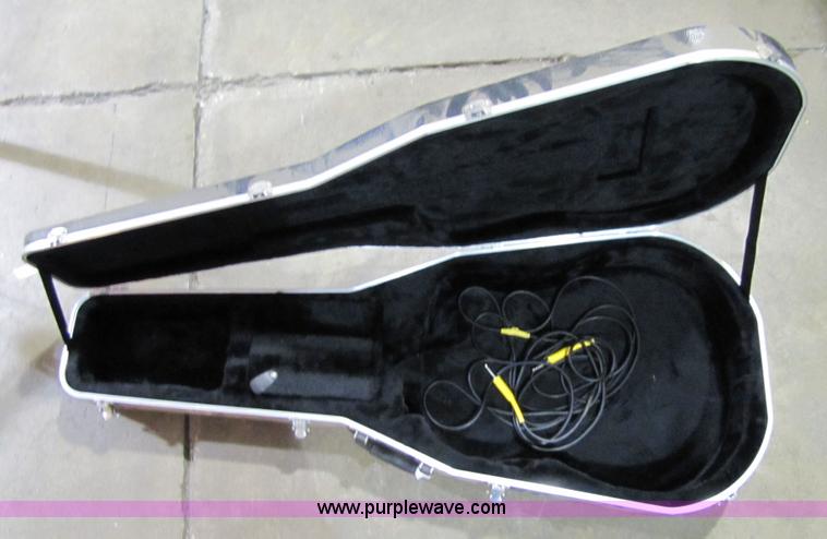 image for item 5332 Eterna acoustic guitar with case and leather sling