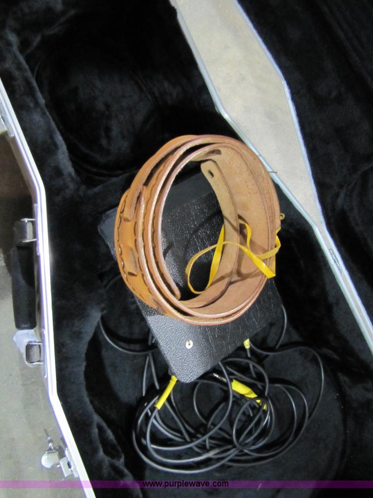 image for item 5332 Eterna acoustic guitar with case and leather sling