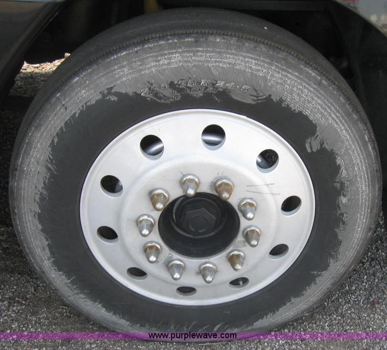 image for item 2734 1999 Freightliner Conventional FLC120 semi truck