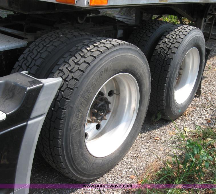 image for item 2734 1999 Freightliner Conventional FLC120 semi truck