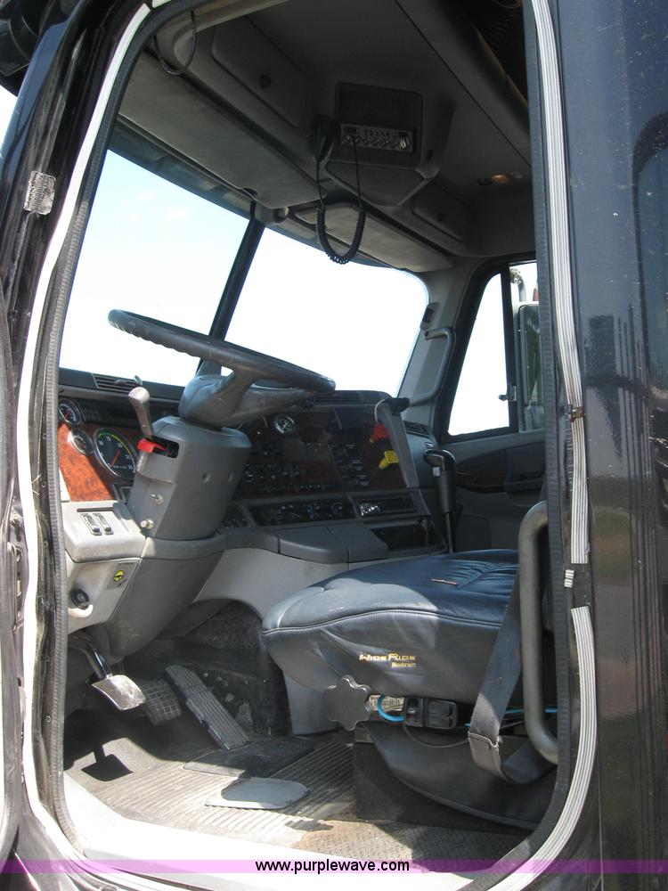 image for item 2734 1999 Freightliner Conventional FLC120 semi truck