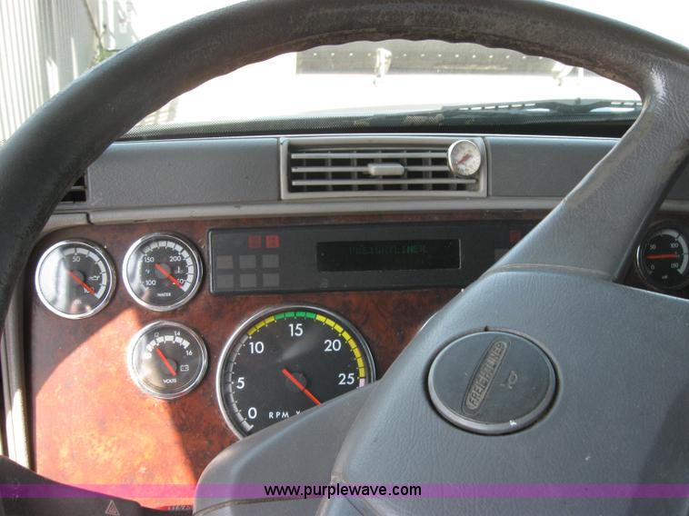 image for item 2734 1999 Freightliner Conventional FLC120 semi truck