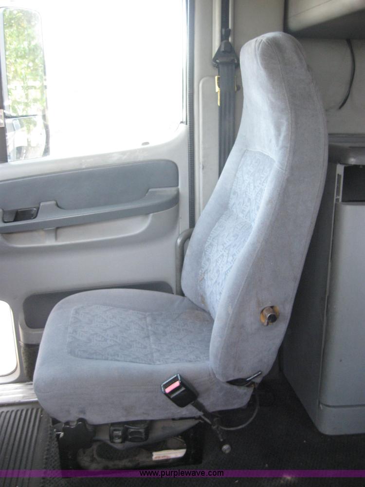 image for item 2734 1999 Freightliner Conventional FLC120 semi truck