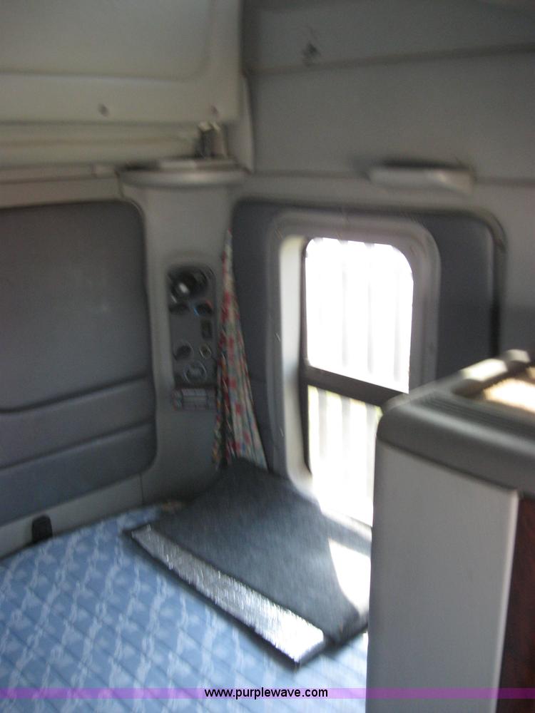 image for item 2734 1999 Freightliner Conventional FLC120 semi truck