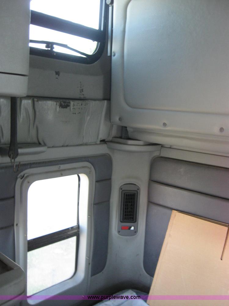 image for item 2734 1999 Freightliner Conventional FLC120 semi truck