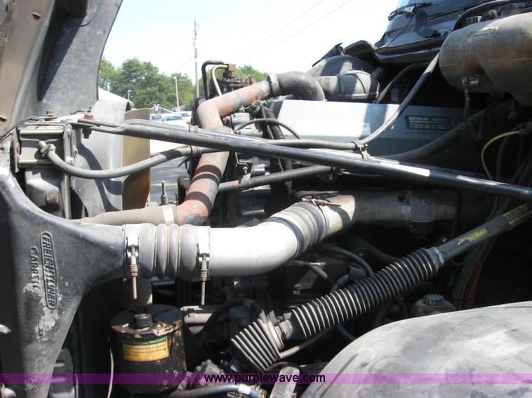 image for item 2734 1999 Freightliner Conventional FLC120 semi truck