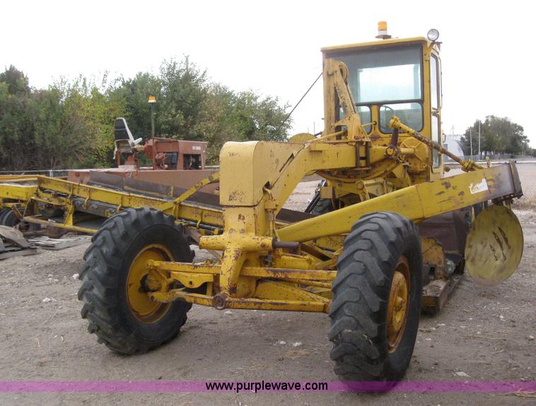 image for item 3083 1967 Caterpillar 120 motor grader with boomer elevator