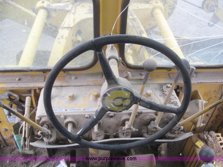 image for item 3083 1967 Caterpillar 120 motor grader with boomer elevator