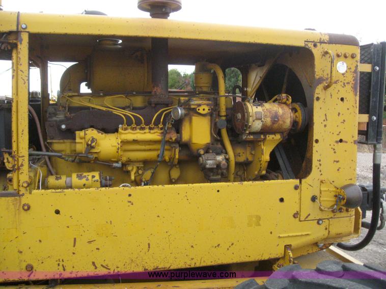 image for item 3083 1967 Caterpillar 120 motor grader with boomer elevator