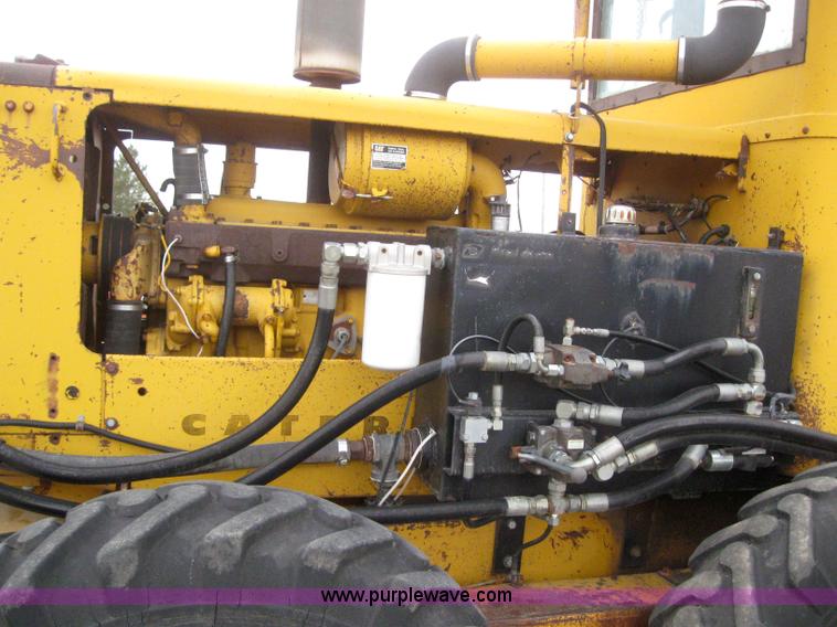 image for item 3083 1967 Caterpillar 120 motor grader with boomer elevator