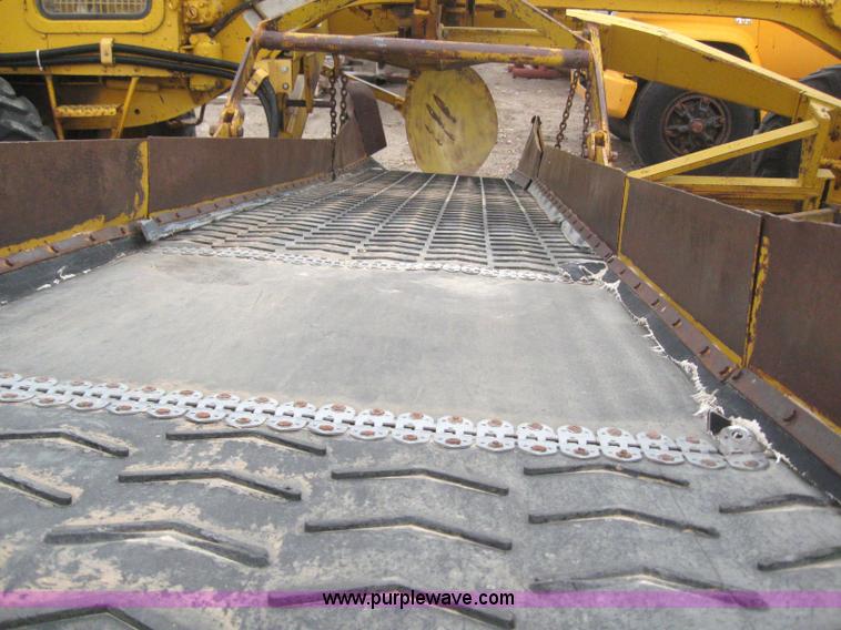 image for item 3083 1967 Caterpillar 120 motor grader with boomer elevator