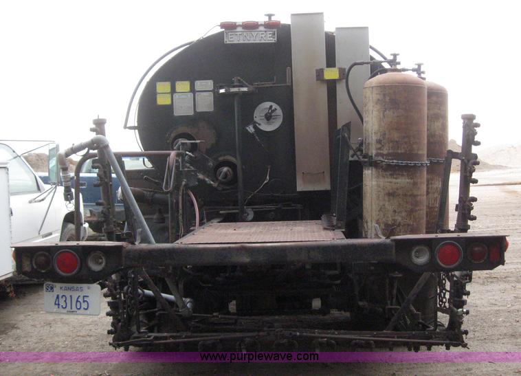 image for item 3093 1973 Ford F700 black topper truck