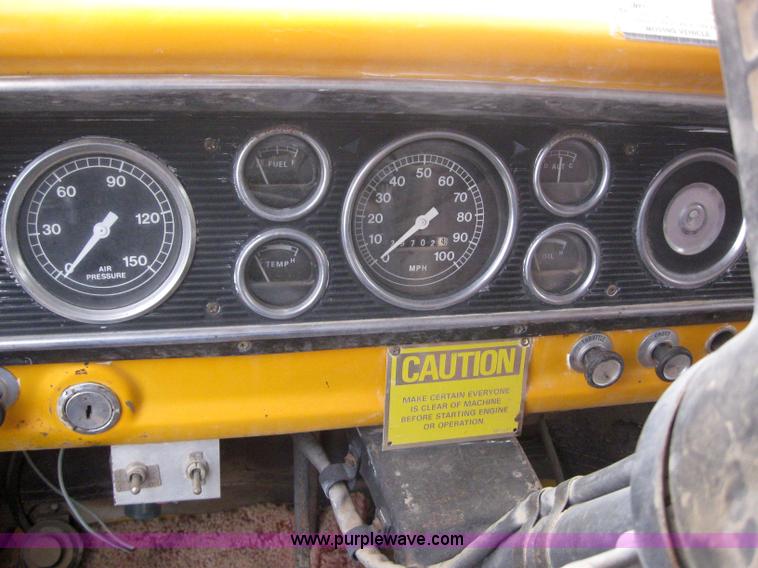 image for item 3093 1973 Ford F700 black topper truck