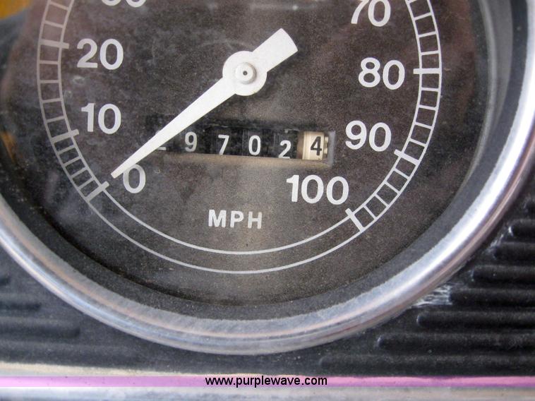 image for item 3093 1973 Ford F700 black topper truck