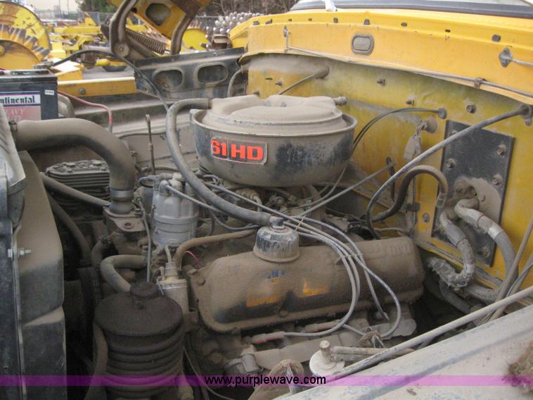 image for item 3093 1973 Ford F700 black topper truck