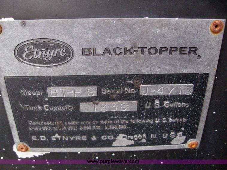 image for item 3093 1973 Ford F700 black topper truck