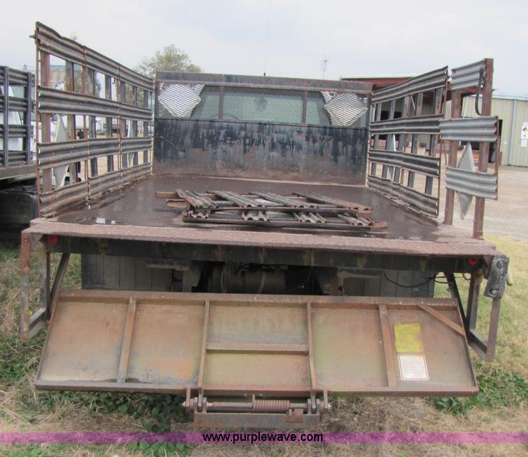 image for item 3468 1994 GMC 6000 Topkick truck with 14' flatbed